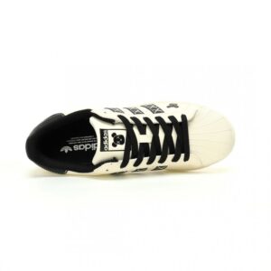 【AT10916】KAWS x Adidas Originals スーパースター スニーカー 絶妙なアートとスポーツの融合 | Superstar
