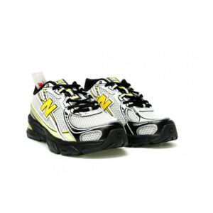 【AT12930】New Balance 740シリーズ レトロランニングシューズ スタイリッシュな金属シルバーと黒のペールイエローカラー | New Balance