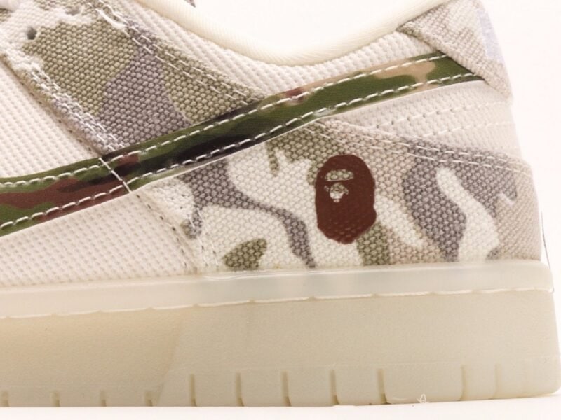 【AT2951】Bape x Nike Dunk Low ホワイト＆ブルー スウッシュ このデザインは伝統的な産業デザインの制約を破ることを主張しています。
