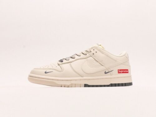 【AT2969】Supreme x Nike Dunk Low ホワイトブラウンのデュアルトーン。このアイテムは、伝統的な産業ラインデザインの制約を破ることを主張しています。