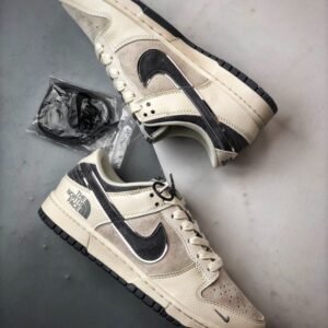 【AT3283】The North Face x Nikeコラボレーションのカジュアルスポーツシューズ、Nike Dunk Low Retro。CDGのクリームホワイトと深灰色のローカットカジュアルスポーツスニーカー。レトロなトレンド。