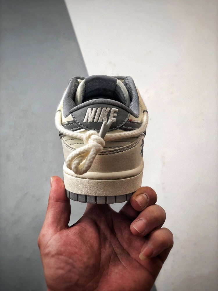 【AT3325】Nike x Stussy Dunk のコラボレーションスポーツシューズは、クラシックなデザインで快適で通気性があり、ファッション性の高いストリートスタイルです。Nike Dunk Low Retro ステューシー刻印ベージュ解体ビンディング ロートップカジュアルスポーツスニーカー